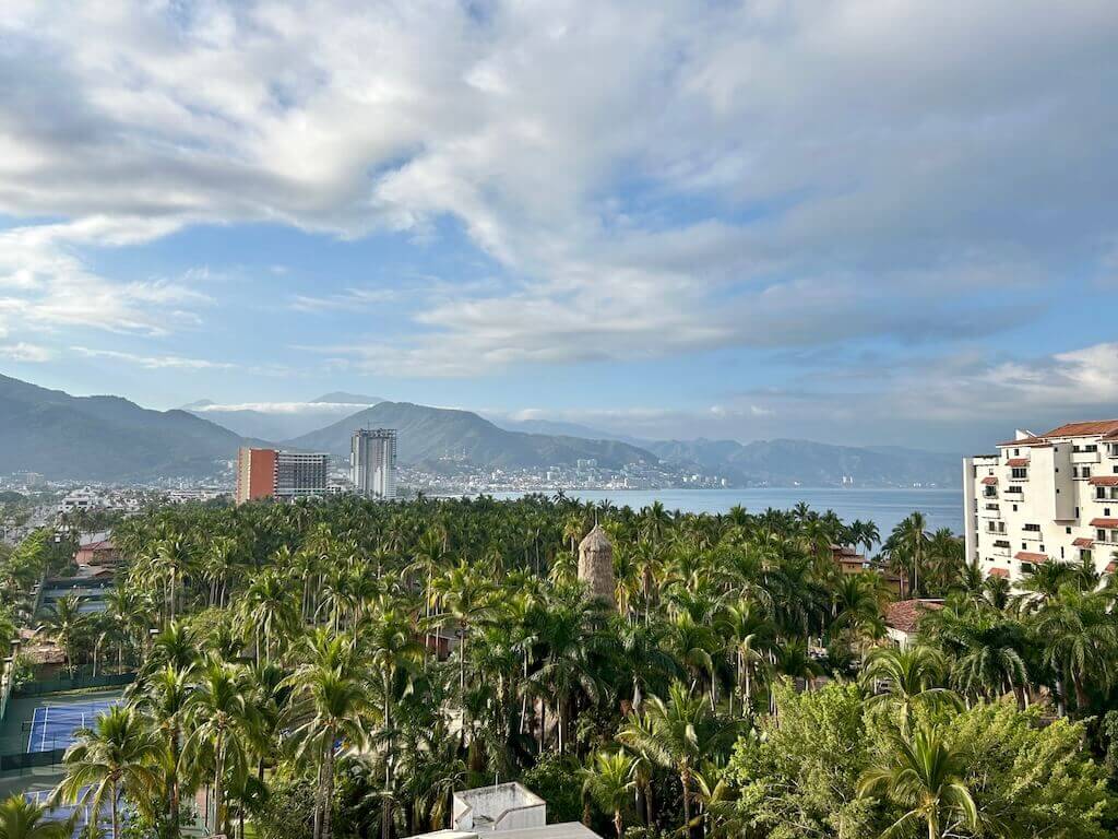 view of downtown Puerto Vallarta in the distance along Banderas Bay looking from the Hotel Mio rooftop