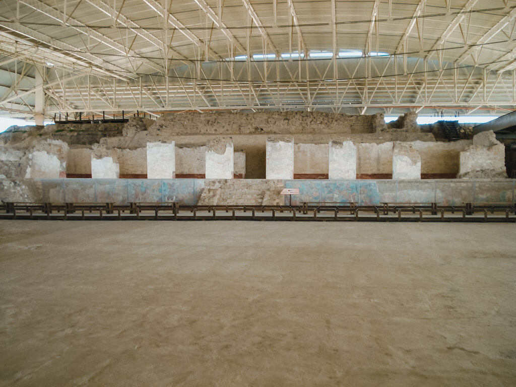 ancient murals painted along the bottom of a pyramid at the Cacaxtla ruins