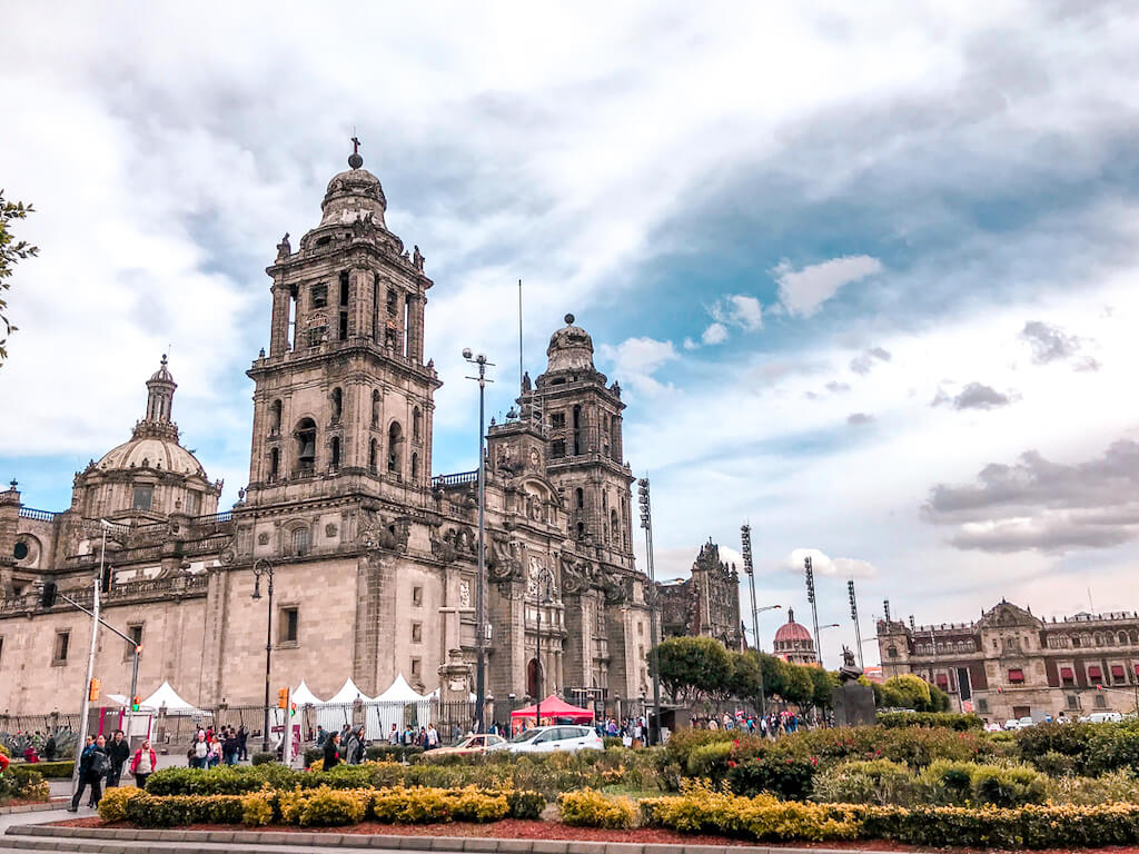 Metropolitan Cathedral on the mexico city zocalo with the palacio nacional in the background