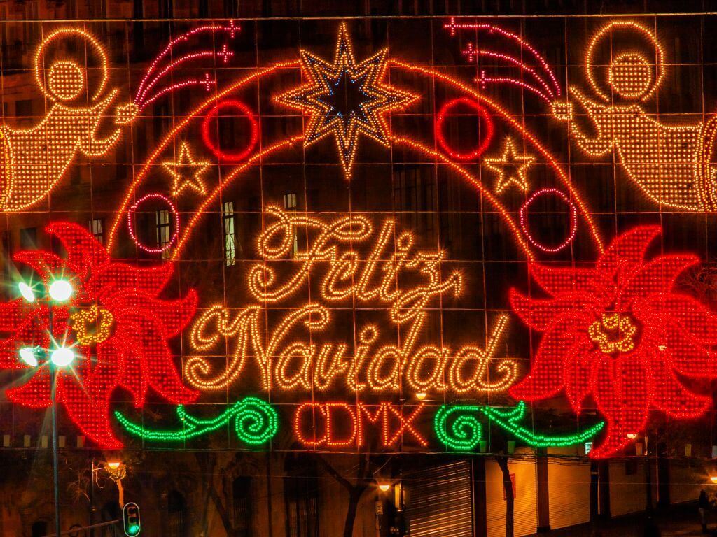 neon lights in the Mexico City Zocalo that read Feliz Navidad CDMX