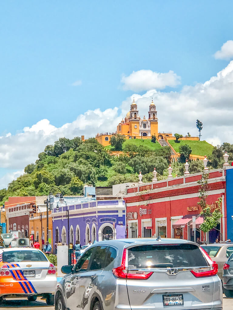 the ruins in Cholula mexico are easily mistaken for a hill given that they are buried under the soil and have a church sitting on top. 