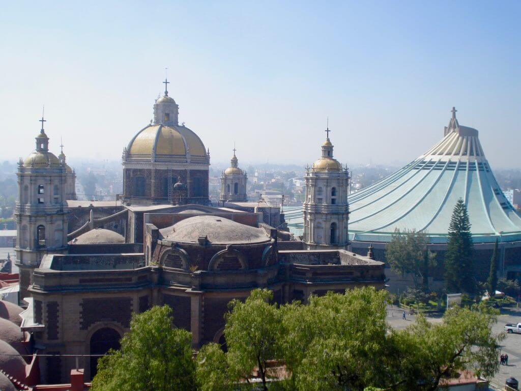 Each year, millions of people travel to the Basilica de Guadalupe (pictured here) to celebrate the die de la Virgen de Guadalupe.