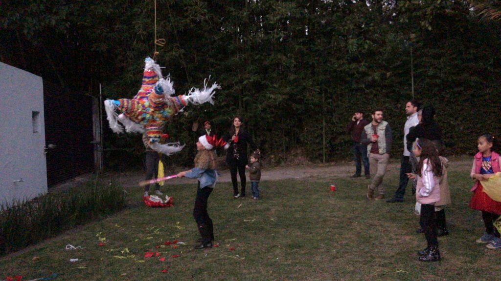 Las posadas are a Mexican tradition that involves singing traditional verses. After the singing is over, the party begins, including piñatas