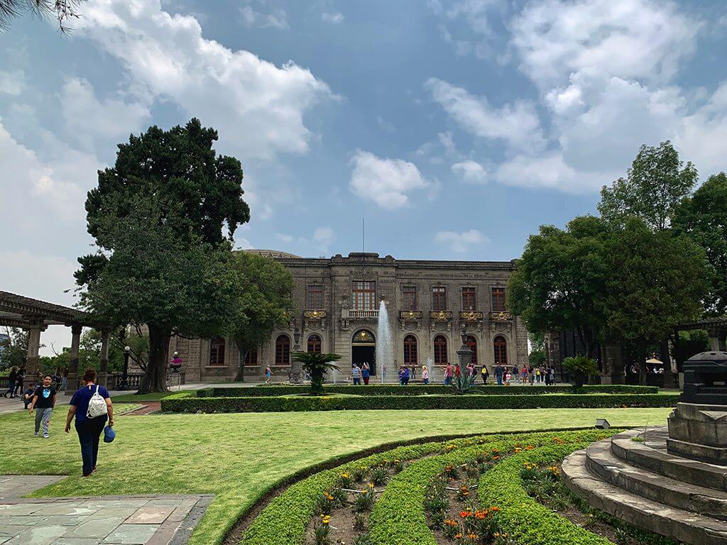 A view of the Castillo de Chapultepec, looking across the lawn and sculpture garden. 