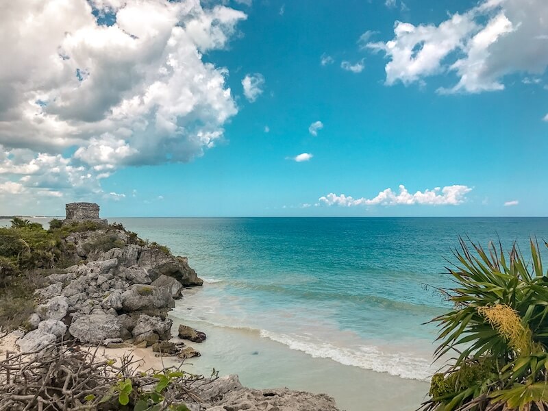 looking south over the Tulum Ruins with the ocean in the distance