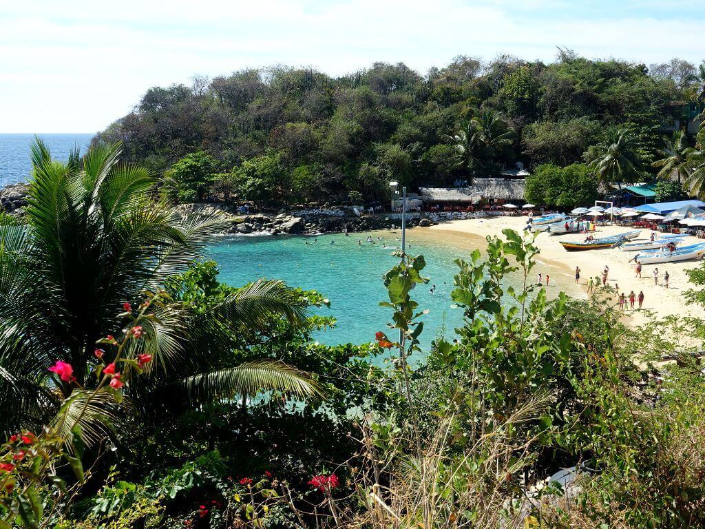 view of a beach in Puerto Escondido, Mexico a popular place to spend the Semana Santa holiday