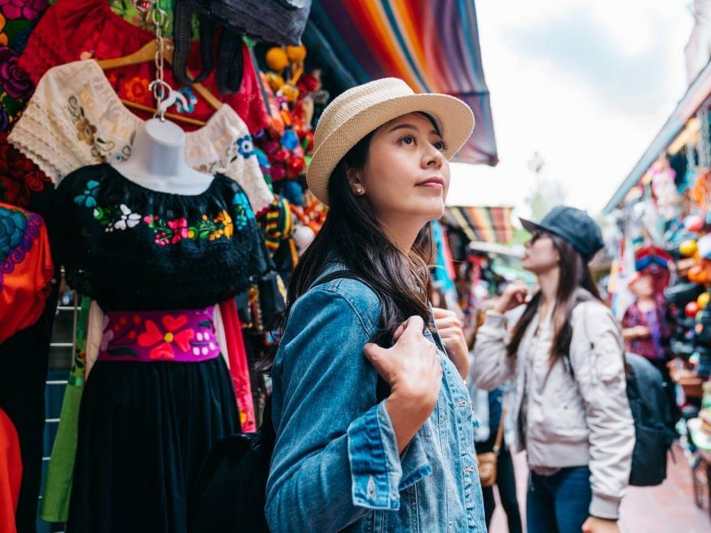 solo traveler shopping in a mexico market