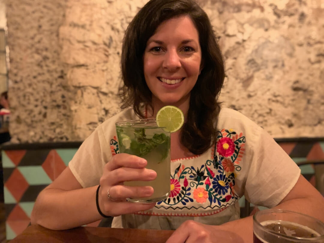 a woman sips a mojito at La Lola Pizzeria in Xalapa, Veracruz