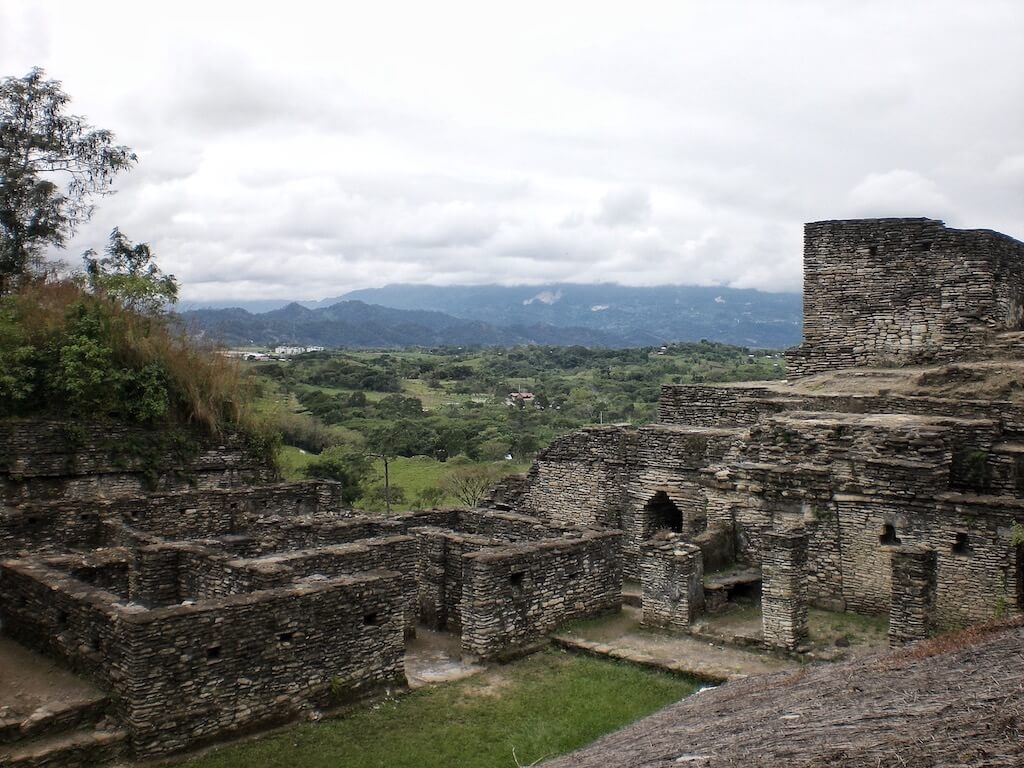 Looking over the ruins of Tonina in Chiapas, with lush, green jungle in the distance