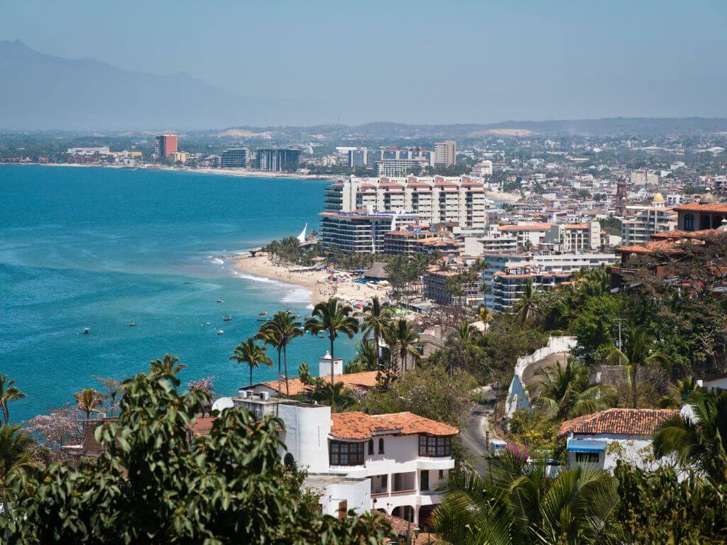 an aerial view of the Puerto Vallarta shoreline looking from Conchas Chinas north, toward the hotel zone